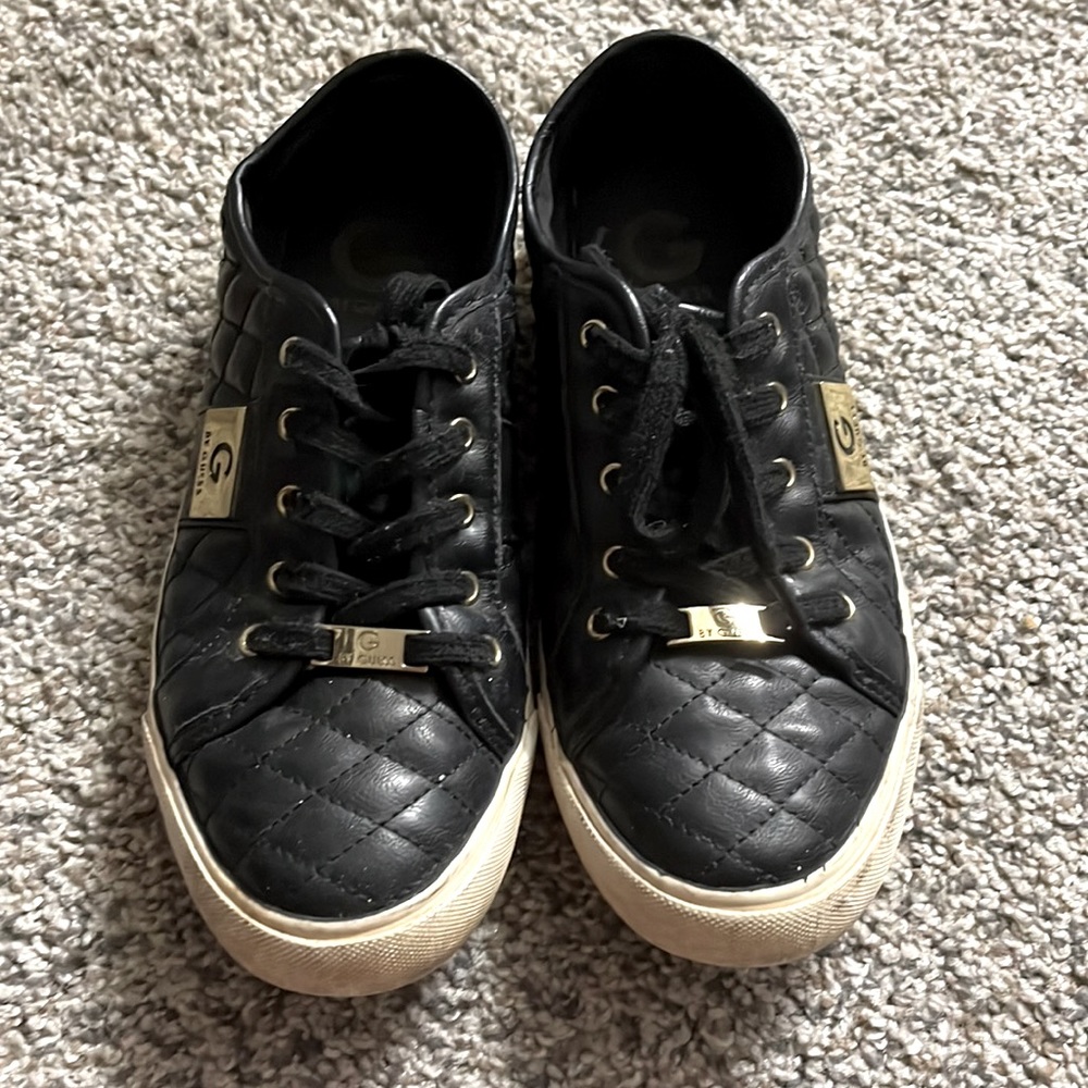 Gold and black Guess sneakers